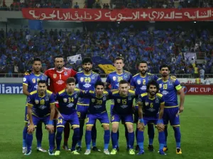 Iraq's al-Quwa al-Jawiya club's starting eleven pose for a group picture ahead of their AFC Cup semi-final match for West Asia against Lebanon's Al-Ahed SC at Karbala Sports City stadium on May 8, 2018.
Mohammed SAWAF / AFP