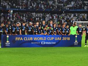 Runner up Abu Dhabi's Al Ain players look at the trophy ceremony after losing the FIFA Club World Cup final football match Spain's Real Madrid vs Abu Dhabi's Al Ain at the Zayed Sports City Stadium in Abu Dhabi, the capital of the United Arab Emirates, on December 22, 2018.
Giuseppe CACACE / AFP