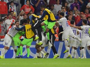 Al Ain's players celebrate after winning the semi final football match of the FIFA Club World Cup 2018 tournament between Argentina's River Plate and Abu Dhabi's Al Ain at the Hazza Bin Zayed Stadium in Abu Dhabi, the capital of the United Arab Emirates, on December 18, 2018.
Giuseppe CACACE / AFP