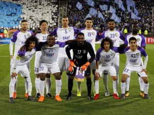Al-Ain's starting eleven pose for a group picture ahead of the AFC Asian Champions League group D football match on March 12, 2018, at the Azadi Stadium in Tehran.
ATTA KENARE / AFP