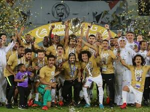 Al Ain players celebrate after winning the President's Cup final against Al Wasl at Zayed Sports City Stadium in Abu Dhabi on Thursday night. (Photo: Ryan Lim)
