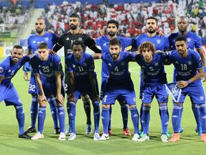 UAE's Al-Nasr club players pose for a picture ahead of their match against Qatar's El-Jaish club during the Asian Champions League quarter-final football match at the Rashid Al-Makhtoum Stadium in Dubai on September 14, 2016.
NEZAR BALOUT / AFP