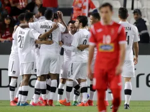 Al-Sadd's players celebrate during the AFC Champions League match al-Sadd vs Persepolis at the Jassim Bin Hamad Stadium in Doha on February 20, 2018.
KARIM JAAFAR / AFP