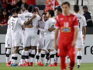 Al-Sadd's players celebrate during the AFC Champions League match al-Sadd vs Persepolis at the Jassim Bin Hamad Stadium in Doha on February 20, 2018.
KARIM JAAFAR / AFP