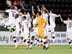 Al-Sadd's players celebrate during the AFC Champions League match between Qatar's al-Sadd and Uzbekistan's FC Nasaf at the Jassim bin Hamad Stadium in Doha, on March 13, 2018.
KARIM JAAFAR / AFP