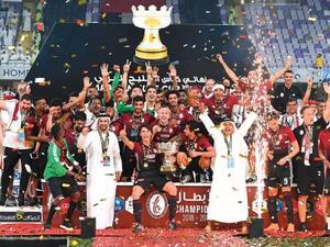 Al Wahda team celebrate after winning the Arabian Gulf Cup title at the Hazza Bin Zayed Stadium on Thursday. They defeated Al Wasl 2-1 in the final to secure the second title in three years. (Photo: Gulf News)