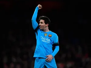 Barcelona's Argentinian forward Lionel Messi celebrates scoring his team's second goal from the penalty spot during the UEFA Champions League round of 16 1st leg football match between Arsenal and Barcelona at the Emirates Stadium in London on February 23, 2016.
Barcelona won the match 2-0.
JAVIER SORIANO / AFP