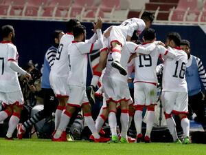 Bahrain's players celebrate after scoring a goal from a penalty shot against Yemen during their 2017 Gulf Cup of Nations group match at Al Kuwait Sports Club Stadium in Kuwait City on December 26, 2017.
Yasser Al-Zayyat / AFP