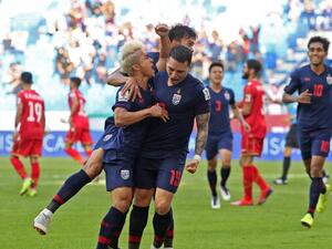  Having fired their coach following a 4-1 thumping last time out, Thailand kick-started their Asian Cup campaign with a 1-0 win over Bahrain. 