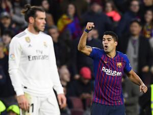 سواريز يحتفل بهدفه مقابل خيبة أمل غاريث بايل