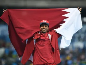 Qatar's Mutaz Essa Barshim celebrates winning the silver medal in the Men's High Jump Final during the athletics event at the Rio 2016 Olympic Games at the Olympic Stadium in Rio de Janeiro on August 16, 2016.
Johannes EISELE / AFP