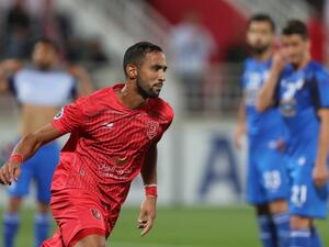 Duhail's defender Medhi Benatia (C) celebrates his opening goal during the AFC champions league Group C football match between Qatar's Al Duhail and Iran's Esteghlal at the Abdullah bin Khalifa Stadium in Doha on March 5, 2019.
KARIM JAAFAR / AFP