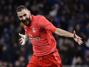 Real Madrid's French forward Karim Benzema celebrates after scoring a goal during the Spanish league football match between RCD Espanyol and Real Madrid CF at the RCDE Stadium in Cornella de Llobregat on January 27, 2019.
Josep LAGO / AFP