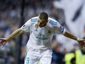 Real Madrid's French forward Karim Benzema celebrates after scoring a second goal during the UEFA Champions League semi-final second leg football match between Real Madrid and Bayern Munich at the Santiago Bernabeu Stadium in Madrid on May 1, 2018.
OSCAR DEL POZO / AFP
