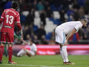 Real Madrid's French forward Karim Benzema bends at the end of the Spanish 'Copa del Rey' (King's cup) quarter-final second leg football match between Real Madrid CF and CD Leganes at the Santiago Bernabeu stadium in Madrid on January 24, 2018.
JAVIER SORIANO / AFP