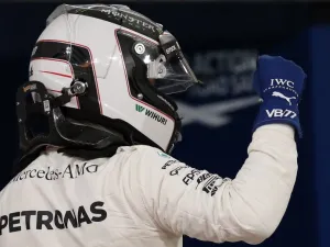 Mercedes' Finnish driver Valtteri Bottas celebrates after taking the pole position at the end of the qualifying for the Bahrain Formula One Grand Prix at the Sakhir circuit in Manama on April 15, 2017.
Karim Sahib / AFP