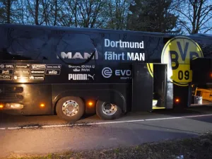 Borussia Dortmund's damaged bus is pictured after an explosion some 10km away from the stadium prior to the UEFA Champions League 1st leg quarter-final football match BVB Borussia Dortmund v Monaco in Dortmund, western Germany on April 11, 2017.
Patrik STOLLARZ / AFP