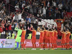 Wu Lei turned in an outstanding individual display as China reached the next stage of the Asian Cup with victory over the Philippines.
