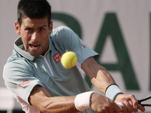 Djokovic beats Federer in a tiebreaker in BNP Paribas Open final