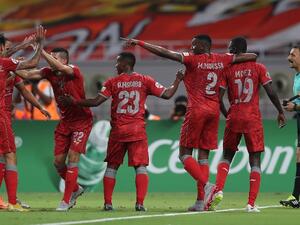 Al-Duhail SC's players celebrate their victory against Persepolis FC during their AFC Champions League football match at Khalifa International Stadium in Doha on August 28, 2018.
Karim JAAFAR / AFP