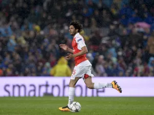 Arsenal's Egyptian midfielder Mohamed Elneny celebrates his goal during the UEFA Champions League Round of 16 second leg football match FC Barcelona vs Arsenal FC at the Camp Nou stadium in Barcelona on March 16, 2016.
JOSEP LAGO / AFP