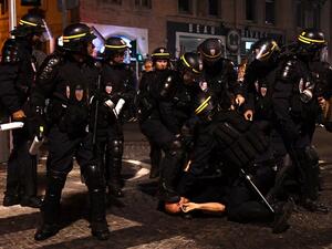A man is arrested by riot police in Marseille, southern France, on June 10, 2016, ahead of England's Euro 2016 football match against Russia on June 11, 2016.
ANNE-CHRISTINE POUJOULAT / AFP