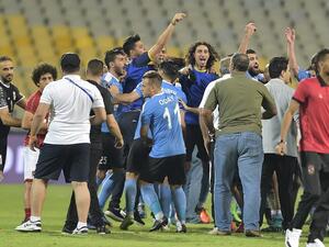 Jordan’s al-Faisaly players celebrate after winning the Arab Club championship semifinal against Egypt’s al-Ahly during the Arab Club championship semifinal match at Borg el-Arab Stadium near Alexandria on August 2, 2017.
MOHAMMED HASSANEEN / AFP