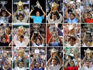 This combination of pictures shows Switzerland's tennis player Roger Federer holding up his 18 Grand Slam titles. 1st row, from left : Australian Open 2017, Wimbledon 2012, Australian Open 2010, Wimbledon 2009, Roland Garros 2009, US Open 2008.
2nd row, from left : US Open 2007, Wimbledon 2007, Australian Open 2007, US Open 2006, Wimbledon 2006, Australian Open 2006.
3rd row, from left : US Open 2005, Wimbledon 2005, US Open 2004, Wimbledon 2004, Australian Open 2004, Wimbledon 2003.
STF / AFP