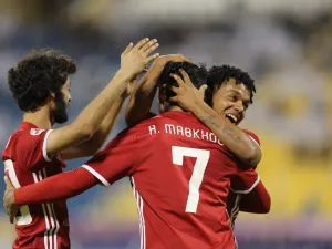 Al Jazira's Ali Ahmed Mabkhout (C) celebrates after scoring a goal during the AFC Champions League match between Qatar's al-Gharafa and UAE's Al-Jazira at the Thani Bin Jassim Stadium in Doha on April 3, 2018.
KARIM JAAFAR / AFP