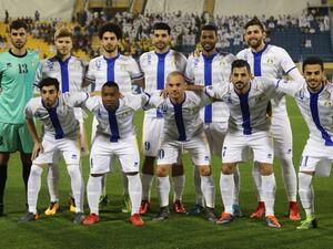 Al-Gharafa's first eleven pose for a team photo prior to the start of the AFC Champions League Group A football match between Qatar's Al-Gharafa and Tractor Sazi Tabriz of Iran at the Thani Bin Jassim Stadium in Doha, on February 19, 2018.
KARIM JAAFAR / AFP