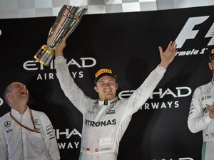 Mercedes AMG Petronas F1 Team's German driver Nico Rosberg celebrates at the end of the Abu Dhabi Formula One Grand Prix at the Yas Marina circuit on November 27, 2016.
MOHAMMED AL-SHAIKH / AFP