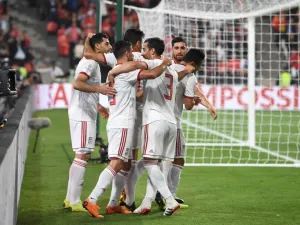 Iran's players celebrate their opening goal during the 2019 AFC Asian Cup quarter-final football match between China and Iran at the Mohammed Bin Zayed Stadium Stadium in Abu Dhabi on January 24, 2019.
Khaled DESOUKI / AFP