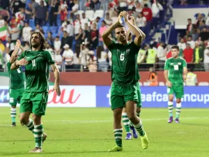 Result between bitter rivals sees Iranians head into Round of 16 as Group D winners