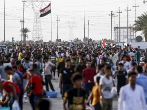 Football fans arrive at Basra Sports City stadium in the southern Iraqi city on March 21, 2018 to attend the international friendly match between Iraq and Qatar.
HAIDAR MOHAMMED ALI / AFP