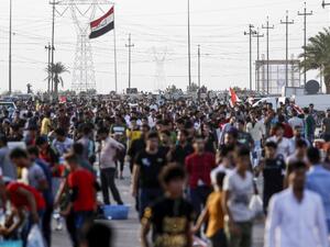 Football fans arrive at Basra Sports City stadium in the southern Iraqi city on March 21, 2018 to attend the international friendly match between Iraq and Qatar.
HAIDAR MOHAMMED ALI / AFP