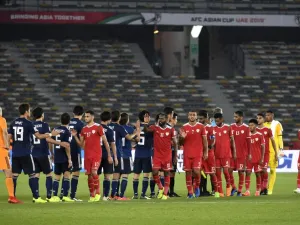 Players shake hands after the 2019 AFC Asian Cup group F football match between Oman and Japan at Hazza bin Zayed Stadium in Abu Dhabi on January 13, 2019.
Khaled DESOUKI / AFP