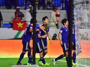 Japan's players celebrate their goal during the 2019 AFC Asian Cup quarter-final football match between Vietnam and Japan at the Al-Maktoum Stadium in Dubai on January 24, 2019.
Giuseppe CACACE / AFP