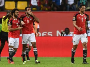 Egypt's midfielder Mahmoud Abdel-Moneim (C) celebrates with teammates after scoring a goal during the 2017 Africa Cup of Nations quarter-final football match between Egypt and Morocco in Port-Gentil on January 29, 2017.
Justin TALLIS / AFP
