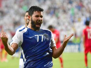 Al Hilal's forward Omar Khribin celebrates after scoring during the first leg of their AFC Champions League semi-final football match at the Mohammed Bin Zayed Stadium in Abu Dhabi on September 26, 2017.
GIUSEPPE CACACE / AFP