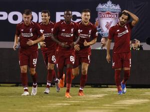 محمد صلاح (يمين) يقود ليفربول مجدداً