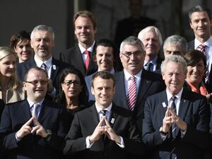 New French President Emmanuel Macron (C) poses next to the president of the IOC Evaluation Commission for the 2024 Olympics Patrick Baumann (L) and French member of the IOC Guy Drut (R) at the Elysee Palace in Paris after a meeting with members of the International Olympic Committee (IOC) Evaluation Commission, on May 16, 2017, prior to a vote for the 2024 Summer Olympics.
STEPHANE DE SAKUTIN / AFP