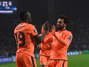 Liverpool's Senegalese midfielder Sadio Mane (L) celebrates with Liverpool's Egyptian midfielder Mohamed Salah after scoring their third goal during the UEFA Champions League round of sixteen first leg football match between FC Porto and Liverpool at the Dragao stadium in Porto, Portugal on February 14, 2018. Liverpool won the game 5-0.
Francisco LEONG / AFP