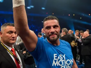 Photo taken on Nov 25, 2017 shows Manuel Charr (C) celebrating after winning the WBA world heavyweight boxing title in a bout against Russia's Alexander Ustinov on November 25, 2017 in Oberhausen, western Germany. Charr on November 29, 2017 ended the confusion about his nationality, admitting that he had no German passport.
Guido Kirchner / dpa / AFP