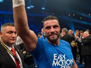 Photo taken on Nov 25, 2017 shows Manuel Charr (C) celebrating after winning the WBA world heavyweight boxing title in a bout against Russia's Alexander Ustinov on November 25, 2017 in Oberhausen, western Germany. Charr on November 29, 2017 ended the confusion about his nationality, admitting that he had no German passport.
Guido Kirchner / dpa / AFP