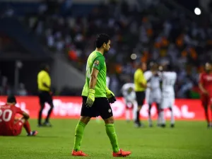 Tunisia's goalkeeper Aymen Mathlouthi walks off the pitch at the end of the 2017 Africa Cup of Nations quarter-final football match between Burkina Faso and Tunisia at the Stade de l'Amitie Sino-Gabonaise in Libreville on January 28, 2017.
GABRIEL BOUYS / AFP