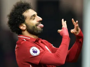  The Egypt winger opened the scoring as the Reds hammered Javi Gracia's men at Vicarage Road but celebrated his effort in a questionable manner (Photo: goal.com)