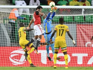 Mali's goalkeeper Oumar Sissoko (C-R) saves a shot on goal by Egypt's forward Marwan Mohsen (C-L) next to Mali's defender Ousmane Coulibaly (L) and Mali's midfielder Mamoutou N'Diaye (R) during the 2017 Africa Cup of Nations group D football match between Mali and Egypt in Port-Gentil on January 17, 2017.
Justin TALLIS / AFP