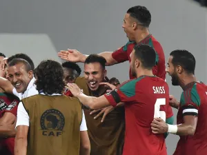 Morocco's players celebrate their third goal during the 2017 Africa Cup of Nations group C football match between Morocco and Togo in Oyem on January 20, 2017.
ISSOUF SANOGO / AFP
