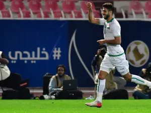 Iraq's forward Mohannad Abdul-Raheem celebrates after scoring a goal against Bahrain during their 2017 Gulf Cup of Nations football match at the Kuwait Stadium in Kuwait City on December 23, 2017.
GIUSEPPE CACACE / AFP