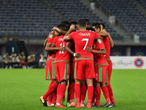 Oman's players celebrate after scoring a goal during the 2017 Gulf Cup of Nations semi-final football match between Oman and Bahrain at the Sheikh Jaber al-Ahmad Stadium in Kuwait City on January 2, 2018.
GIUSEPPE CACACE / AFP